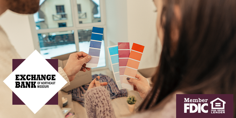 A couple looking at color swatches 