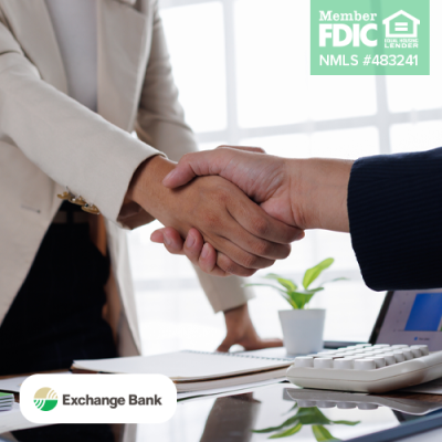 Person in interview shaking hands with hiring person