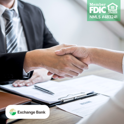 Person in interview shaking hands with hiring person